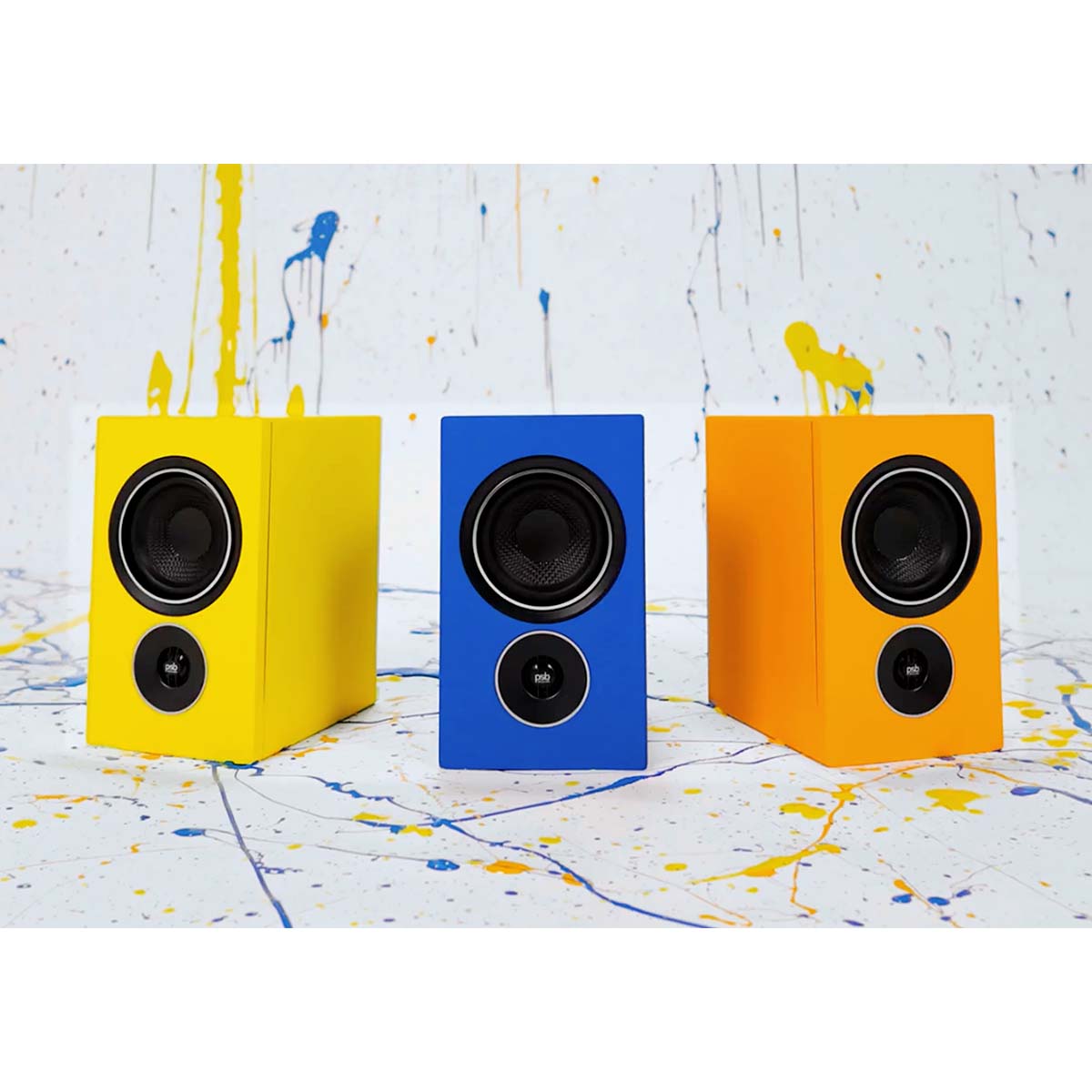 PSB Alpha iQ Streaming Powered Speakers - 3 single speakers with backdrop - (left to right) yellow