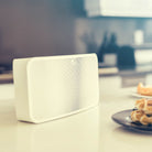 Bluesound Pulse Mini 2i Front View In White Lifestyle