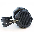 Side profile of Audeze LCD-X open-back headphones laying down.