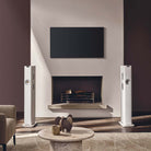 KEF LS60 Wireless Music System - Mineral White - Pair - in living room with TV and fireplace