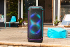 JBL PartyBox Ultimate speaker on a swimming pool deck