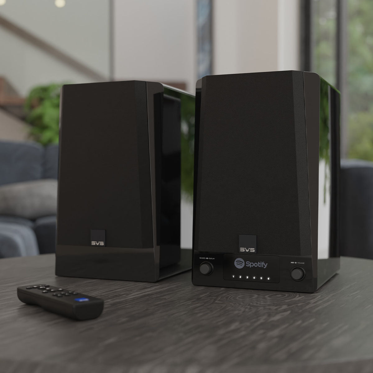 SVS Prime Wireless Pro Powered Speakers - Pair - on desk with remote