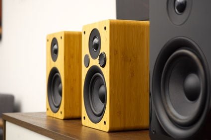 Peachtree M24 and M25 Powered Speakers in black and bamboo