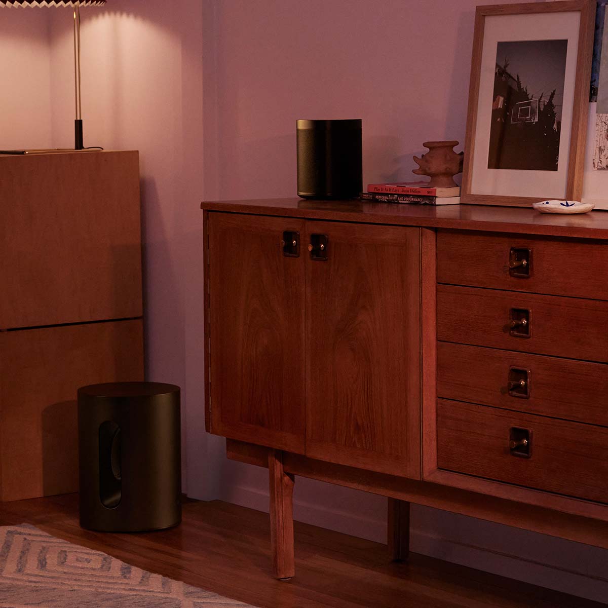 Sonos Sub Mini - Black in room next to credenza