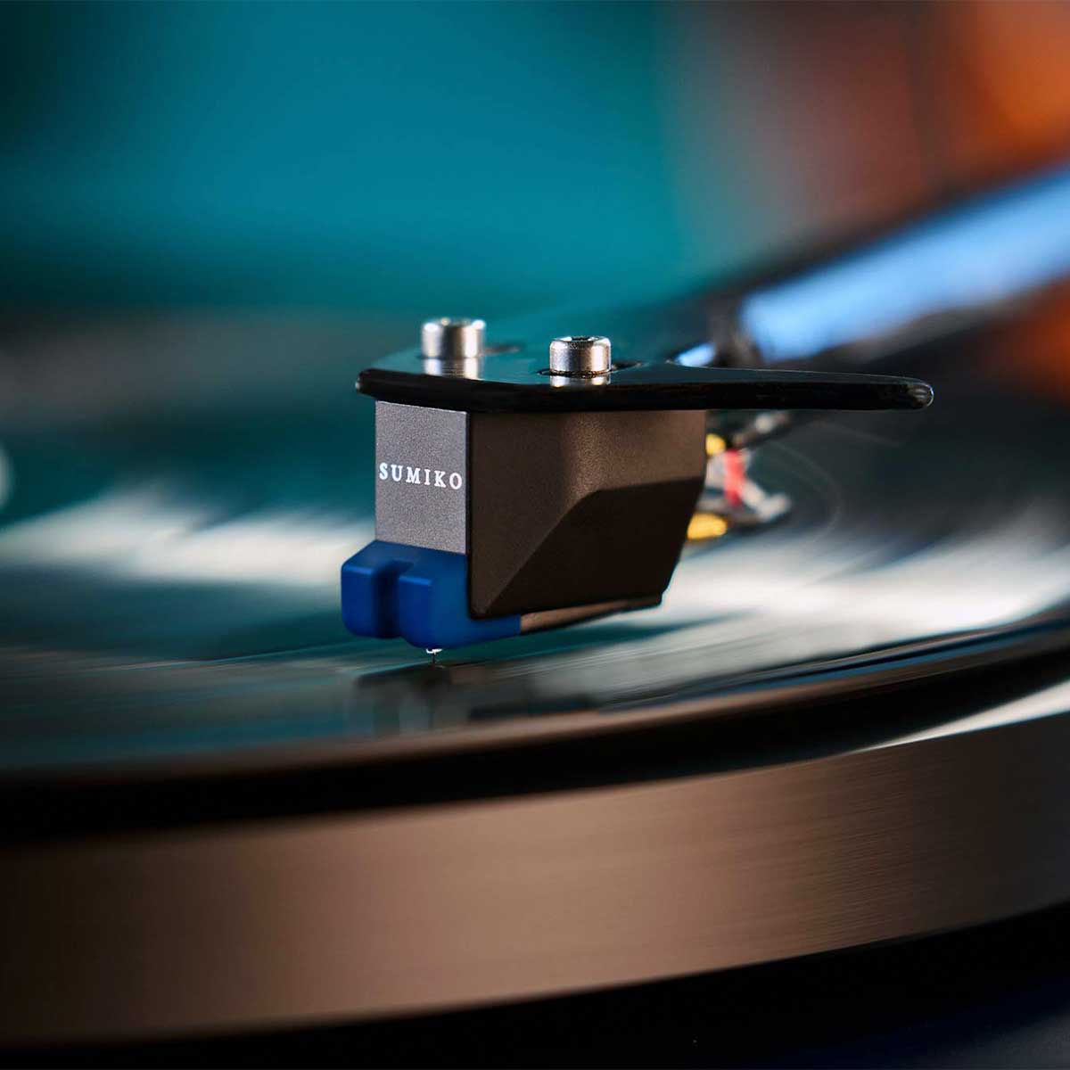 Close-up shot of the Sumiko Wellfleet MM Phono Cartridge playing a vinyl record.