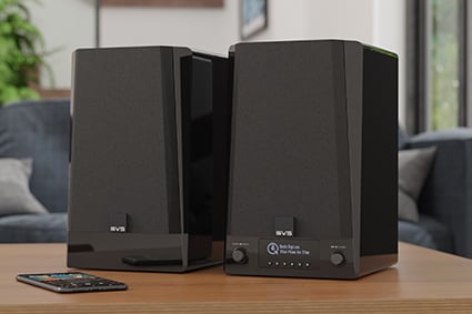 SVS Prime Wireless Pro pair in black on a table in a living room