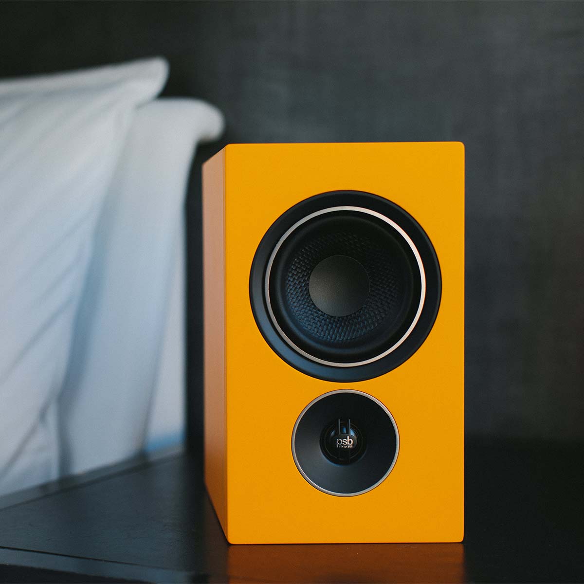 PSB Alpha iQ Streaming Powered Speakers - yellow single - lifestyle image